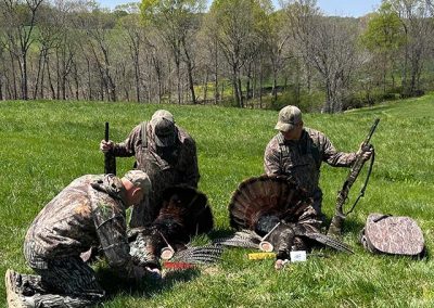 group of men turkey hunting